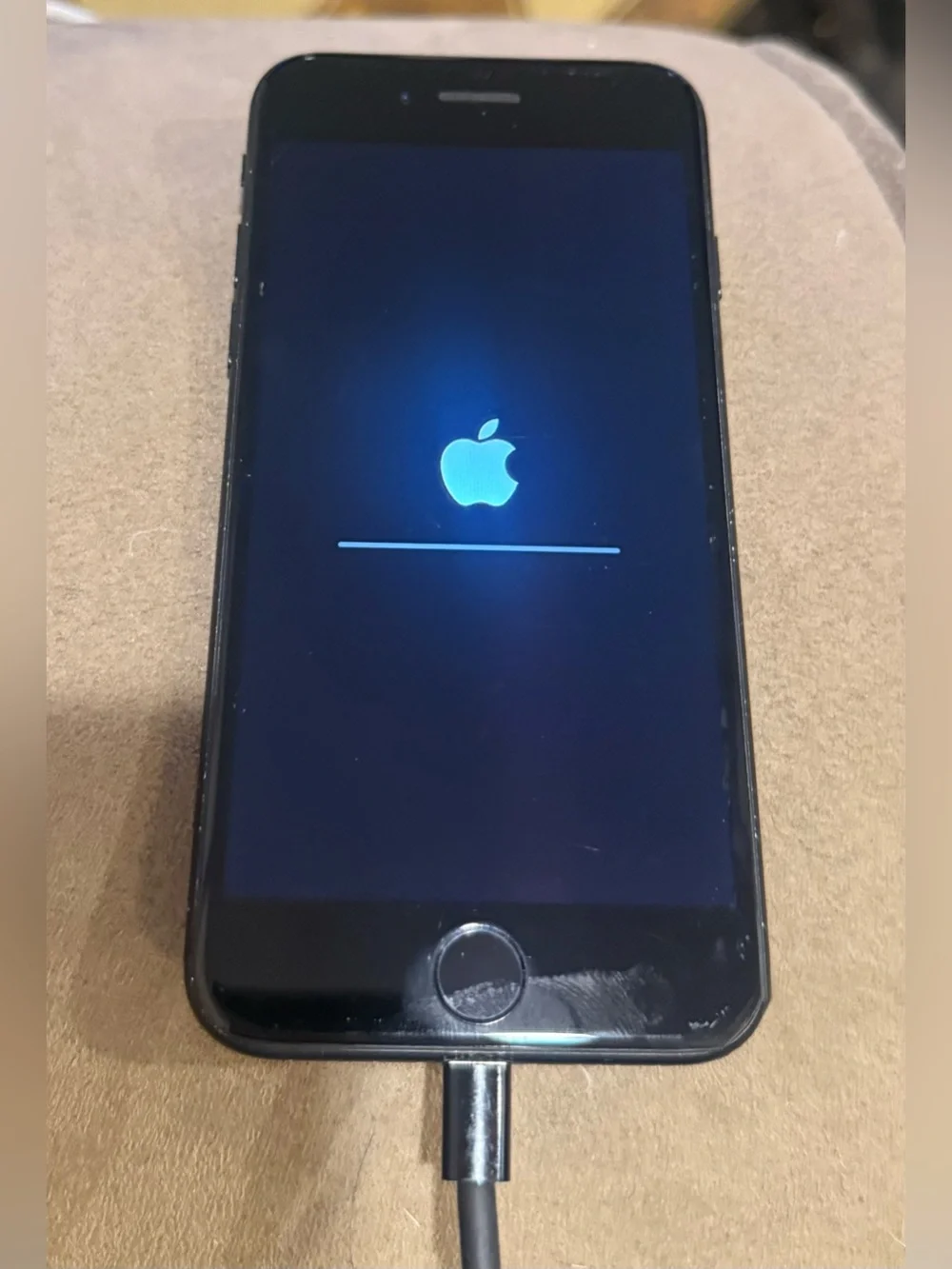 Retired working iPhone 7. Matte Black. Including a charging cord.